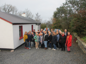 A group of people stood outside Tossey's Cottage