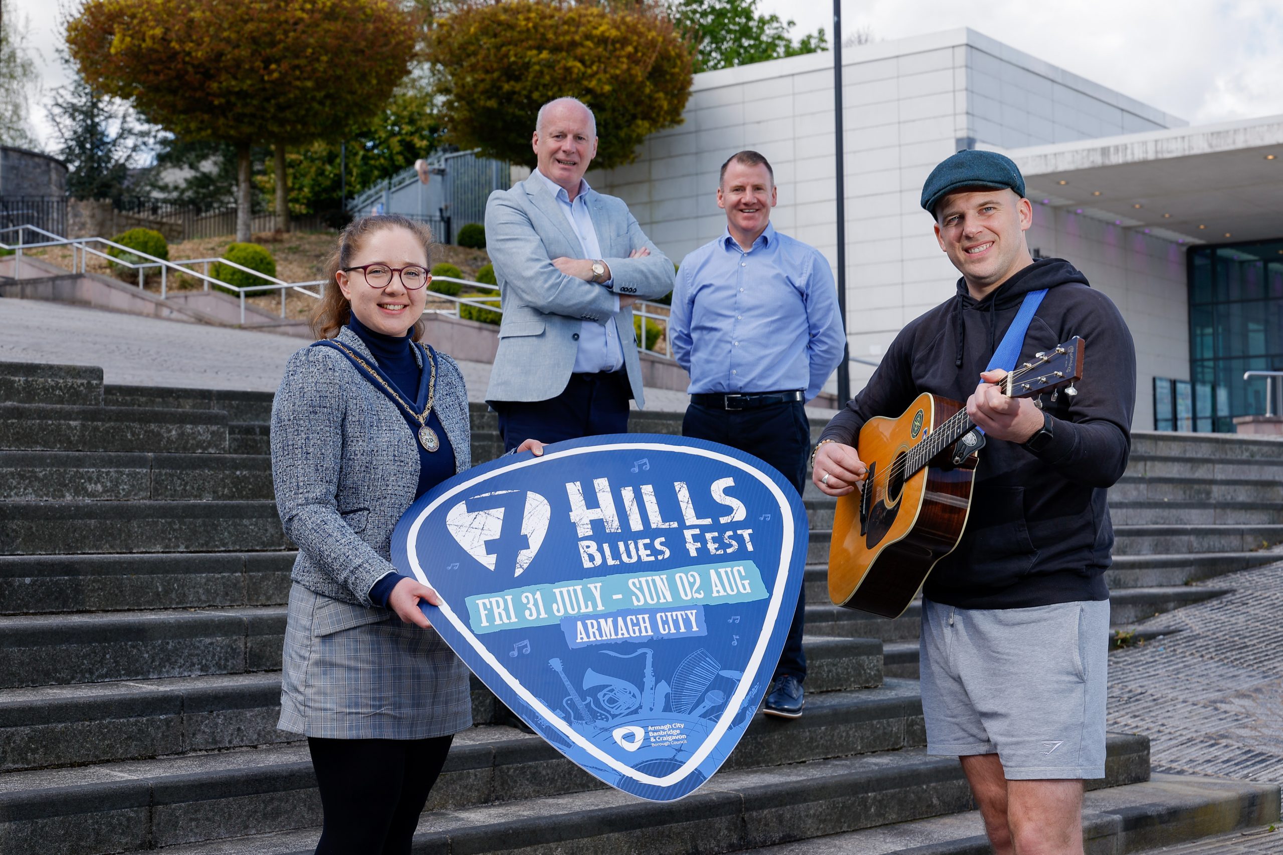 7 Hills Blues Fest Launch 2026 7 Hills Blues Fest 2026 Launch Photo. Featured in photo from left to right: Deputy Lord Mayor, Councillor Jessica Johnston, Art O’Hagan MBE, Chair of Armagh City Centre Management, Tony McKeown, Events Officer, ACBCBC and Marty Rafferty, Marty Rafferty Music.