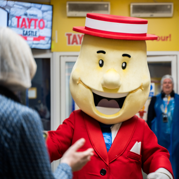 Mr Tayto greeting a visitor inside the Tayto Factory tour.