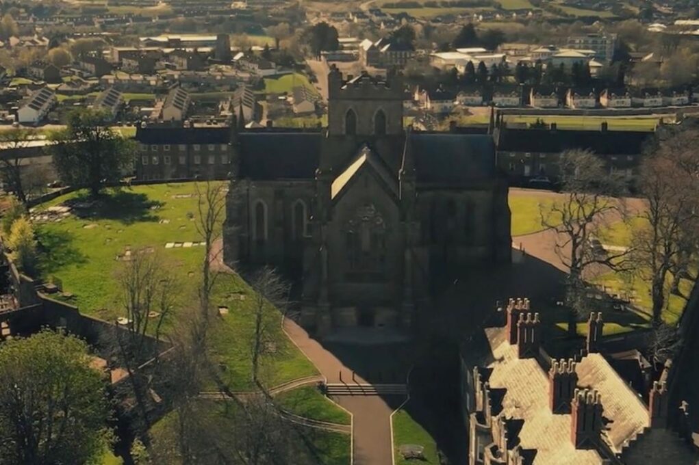Hill of Armagh Aerial view of St Patrick’s Church of Ireland Cathedral on the Hill of Armagh, surrounded by historic buildings, cathedral gardens and the city skyline.